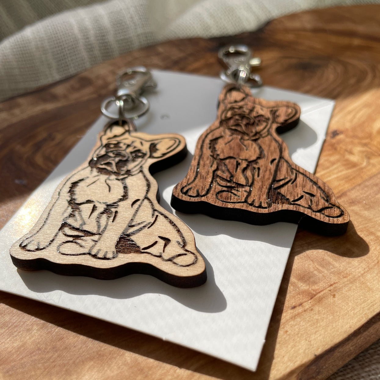 dog wooden keychain laying flat